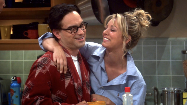 Penny hugging Leonard in kitchen