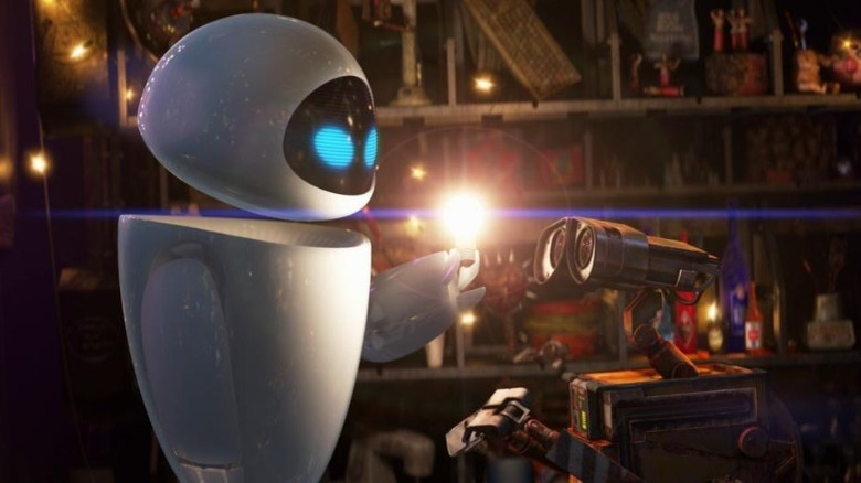EVE turns on a light bulb while WALL-E watches