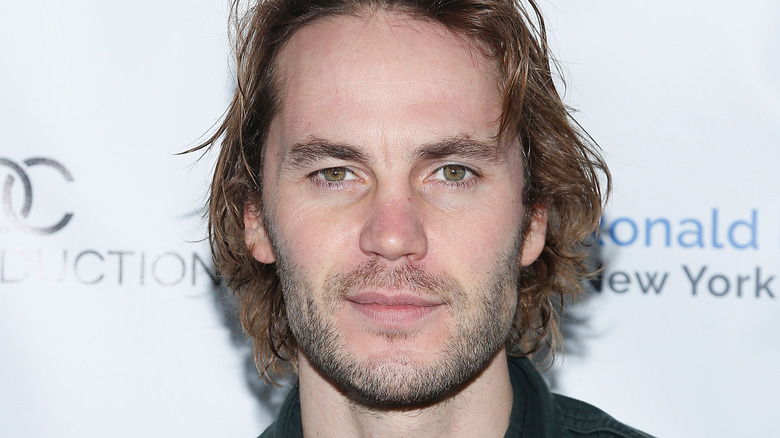 Taylor Kitsch with beard and mustache