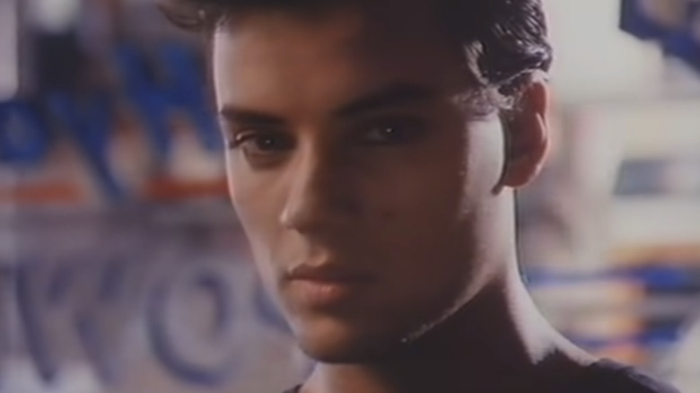 Nick Kamen looks at the camera