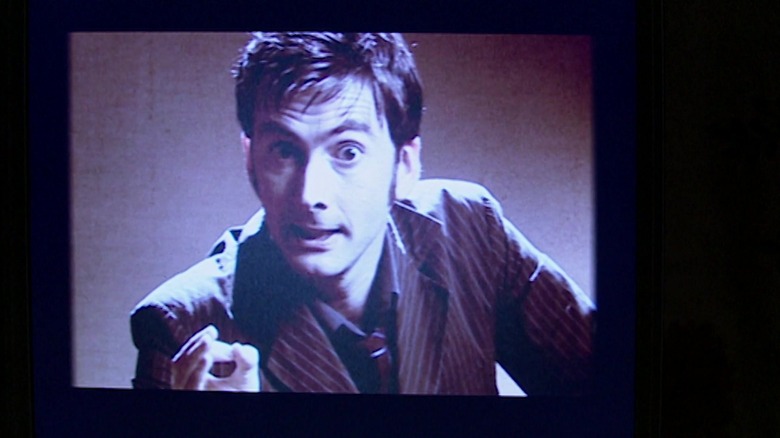 The Doctor speaks on a TV monitor in "Doctor Who" (2007)
