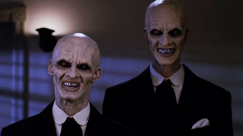 The Gentlemen smile menacingly in "Buffy the Vampire Slayer" (1999)