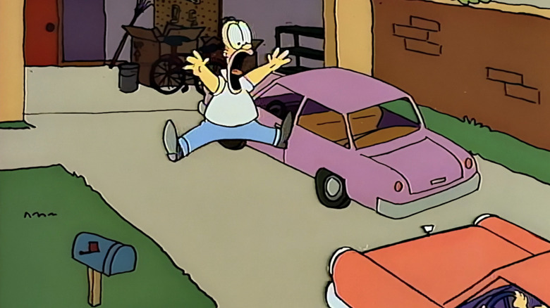 Homer is almost hit by a car