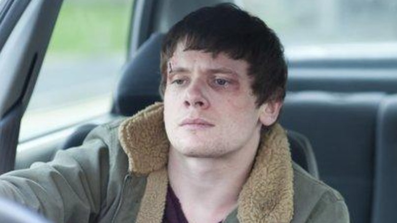 Jack O'Connell driving a car