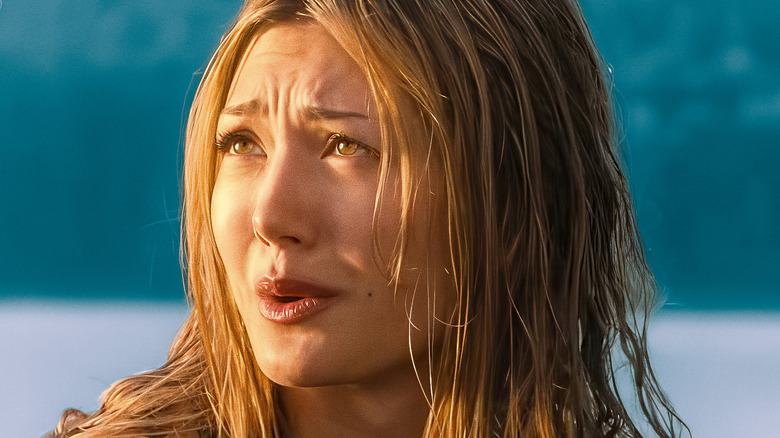 Teagan talking in front of the water on Crew Girl