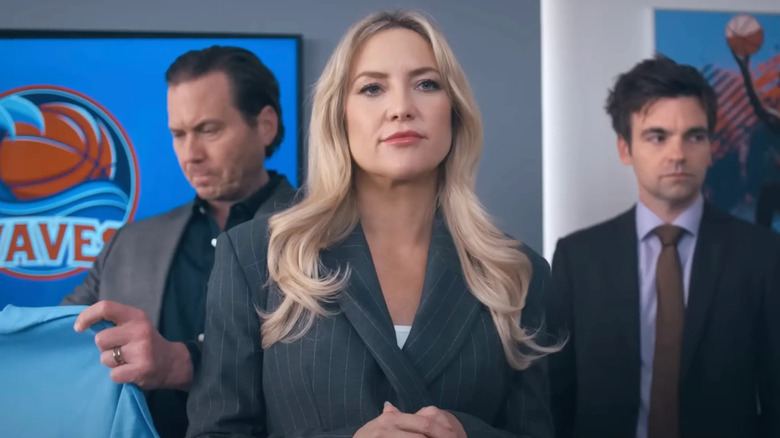 Isla standing in front of Ness and Sandy on Running Point