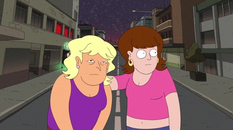 Sarah Doyle putting her arm around Rachel in the middle of the street in YOLO