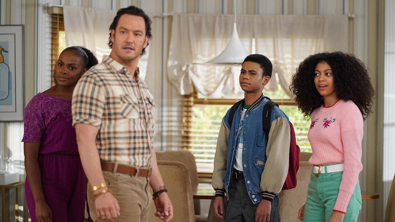 The family looks left