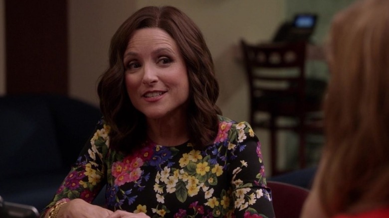 Selina answers a phonecall