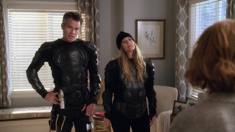 Sheila surrounded by body parts in "Santa Clarita Diet" (2017-2019)