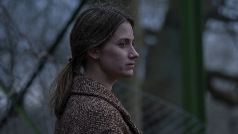 Danica Curcic standing by fence