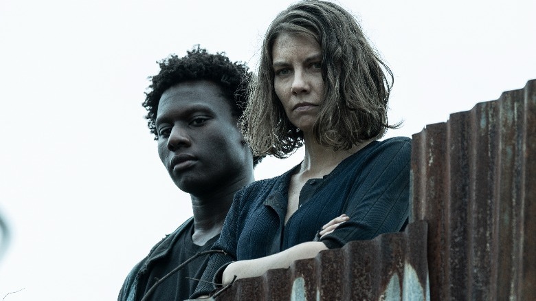 Maggie & Elijah staring forward