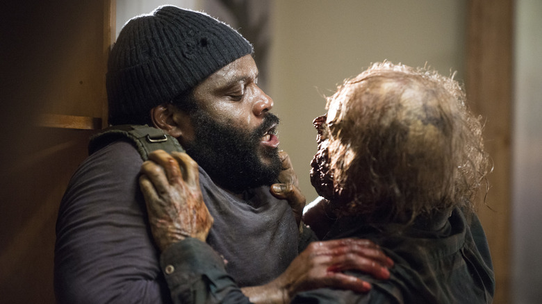 Tyreese grappling with a walker