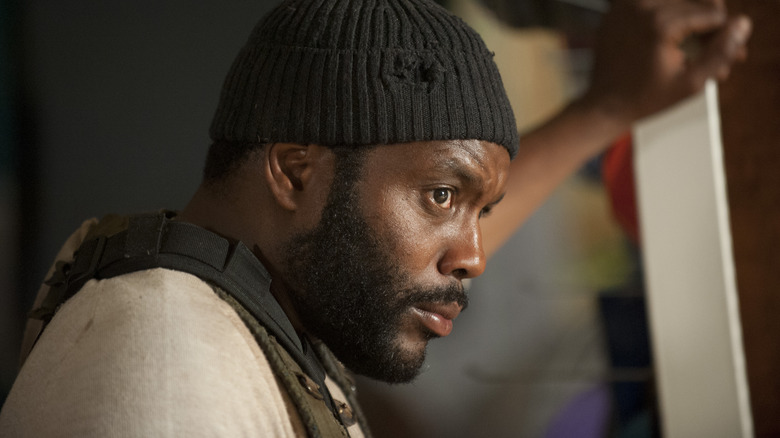 Tyreese leaning on door