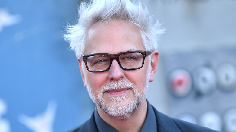 James Gunn smiles at a red carpet event