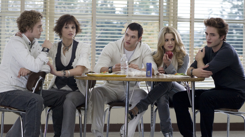 The Cullens sitting in the school cafeteria in Twilight