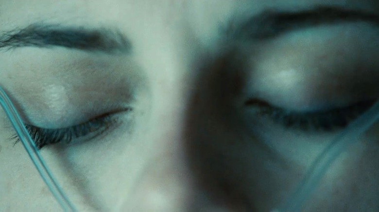 Bella Swan eyes closed with oxygen tube in eyelashes