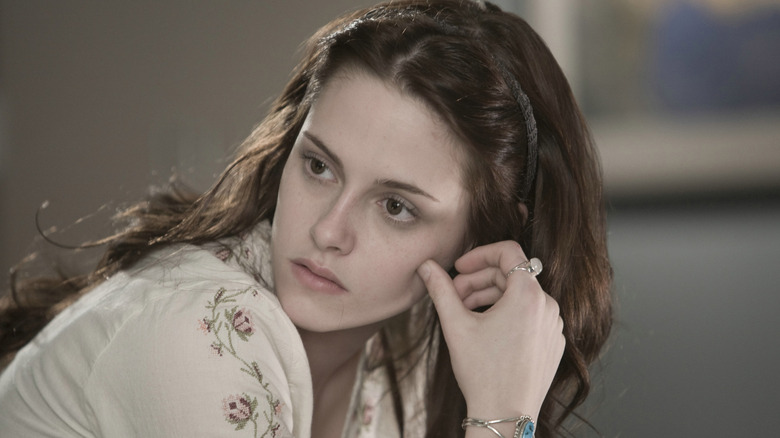 Bella Swan looks over her shoulder