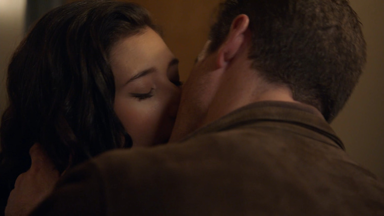 Violet kissing Carver