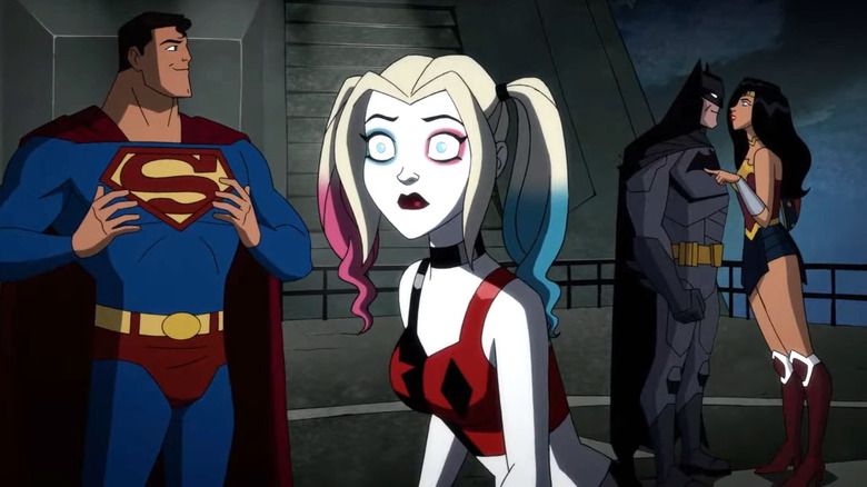 Kaley Cuoco's Harley Quinn standing in front of Superman, Batman, and Wonder Woman in Harley Quinn