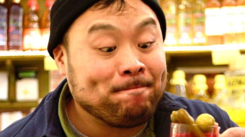 David Chang looking at something delicious