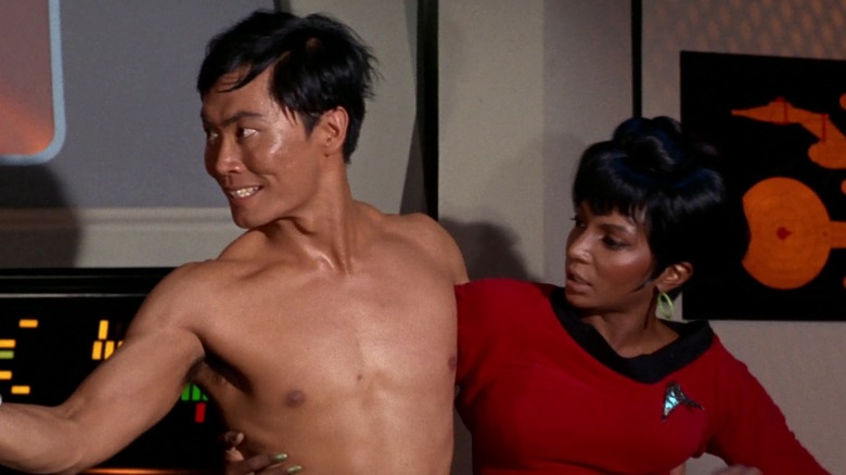 Sulu holds Uhura on Star Trek: The Original Series The Naked Time  (1966 - 1969)