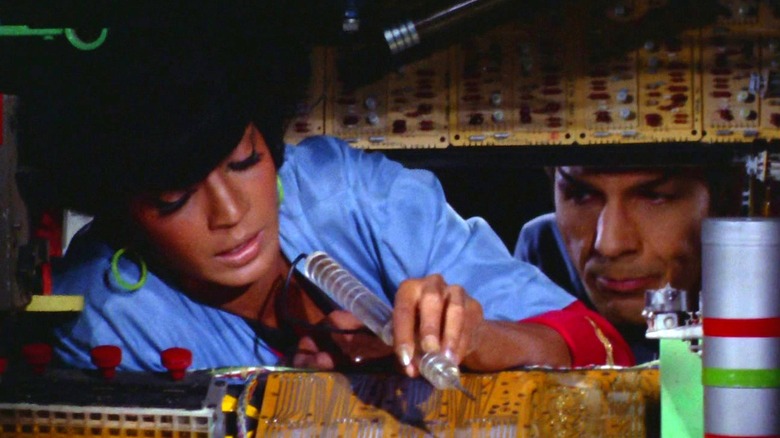Spock and Uhura working on the ship on Star Trek: The Original Series (1966 - 1969)