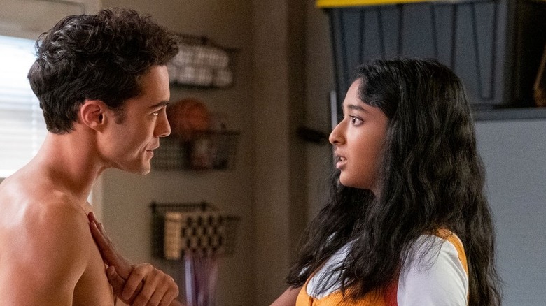 Maitreyi Ramakrishnan and Darren Barnett in Never Have I Ever hand on chest