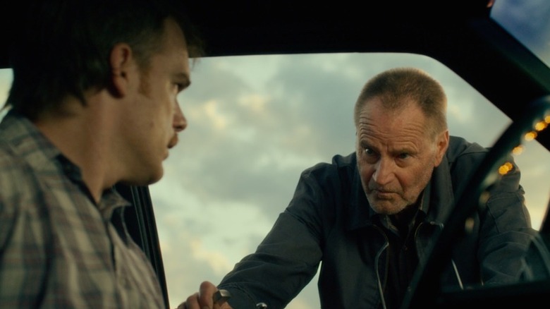 Sam Shepard staring at Michael C. Hall
