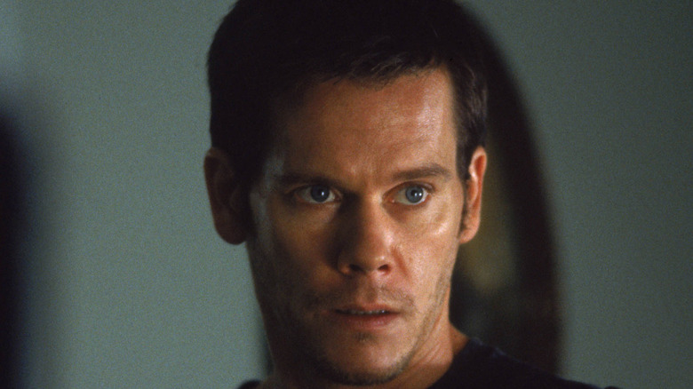 Kevin Bacon looking intense