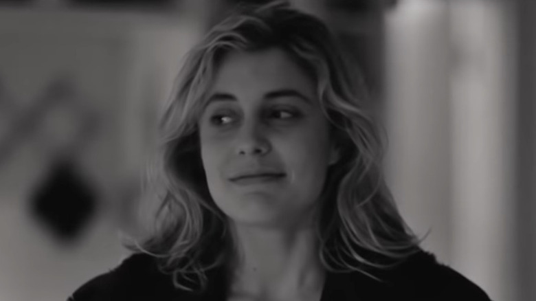 Frances smirks