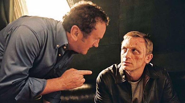 Gene wags his finger at Daniel Craig