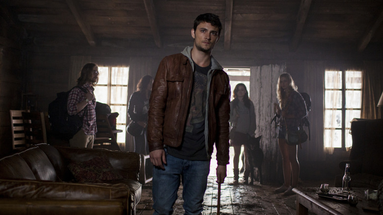 Olivia, Eric, David, Mia, and Natalie entering the cabin in Evil Dead (2013)