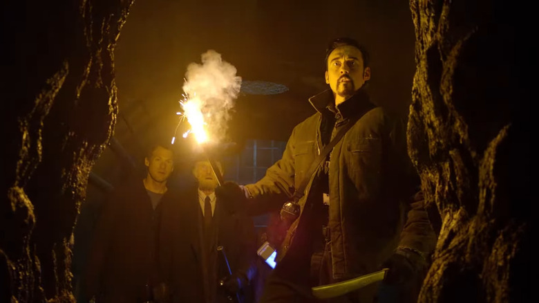 Vasiliy Fet holding a flare in The Strain