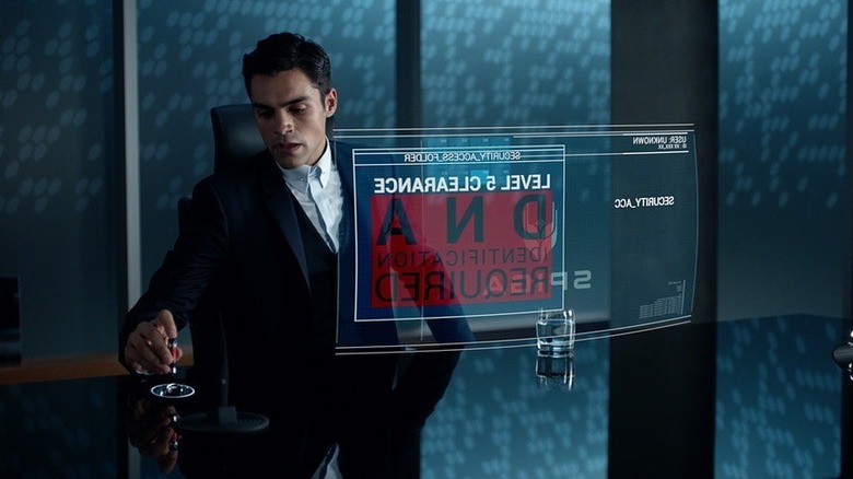 Ben Larson holding a vial in Incorporated