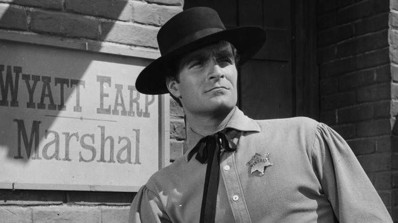 Marshal Wyatt Earp stands before his sign on The Life and Legend of Wyatt Earp (1955-1961)