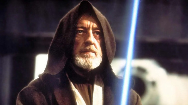 Obi-Wan raises lightsaber