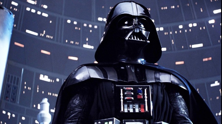Darth Vader standing over Luke