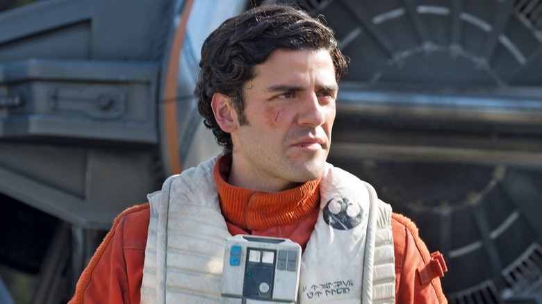 Poe wearing his pilot's uniform