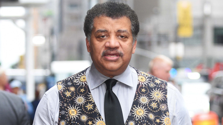 Neil deGrasse Tyson walking