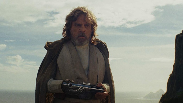 Luke with his lightsaber