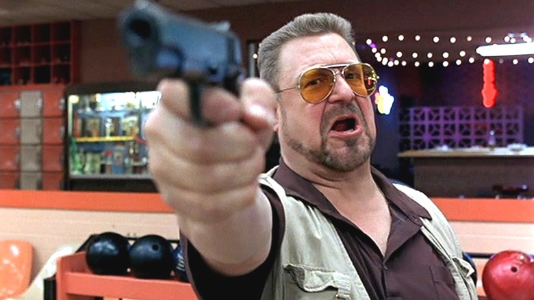 Walt pointing gun