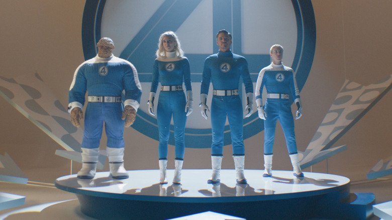 The Fantastic Four stand on a platform in "The Fantastic Four: First Steps" (2025)