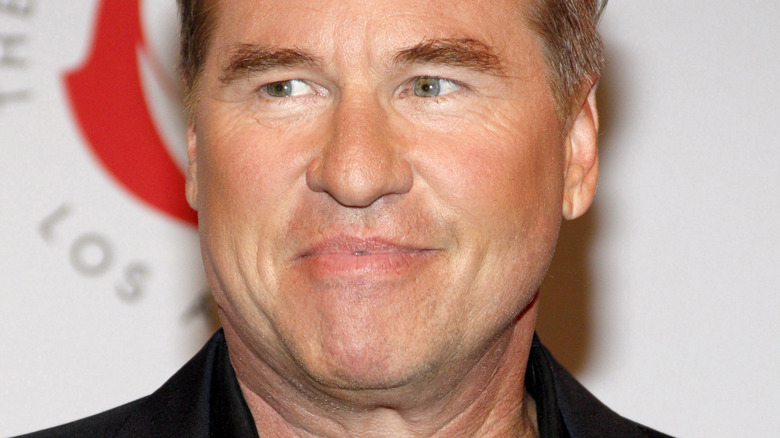 Val Kilmer smiling 