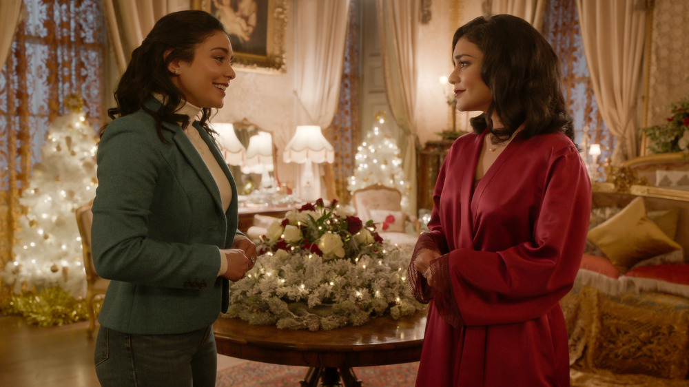 Vanessa Hudgens' Margaret and Stacy chat by the Christmas tree in The Princess Switch: Switched Again