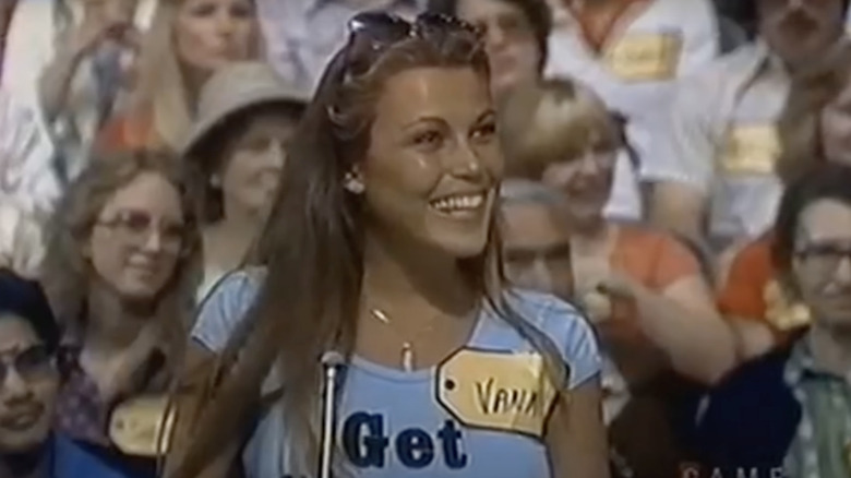 Vanna White wearing a yellow name tag