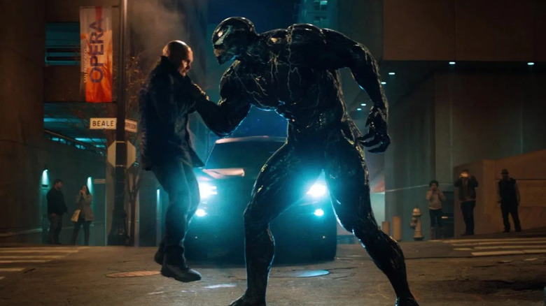 Venom intimdating a criminal in Venom (2018)
