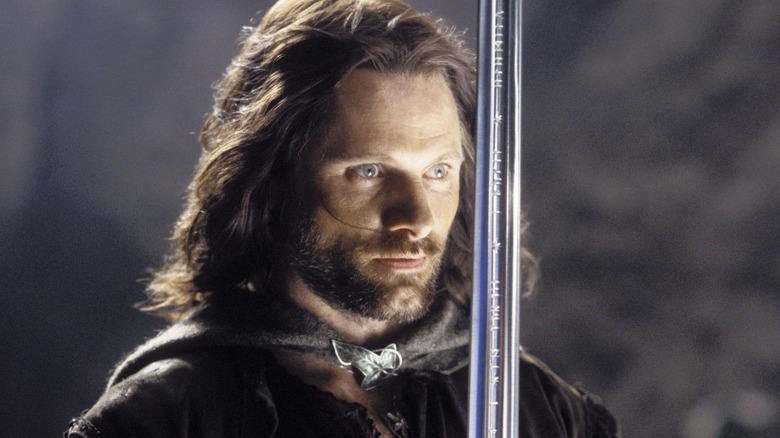 Aragorn holding sword