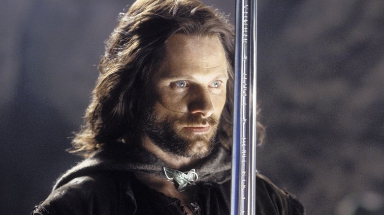Aragorn holding sword