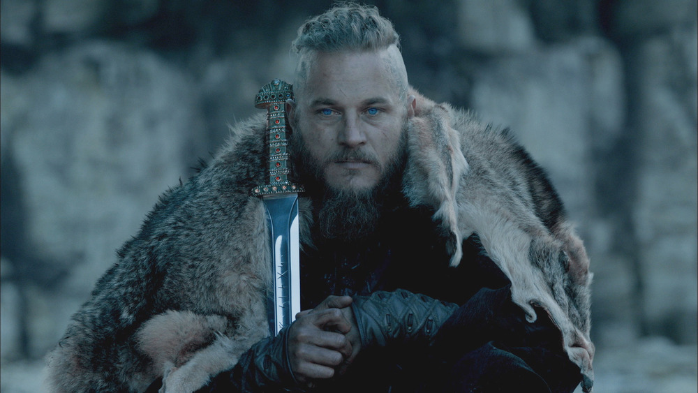 Ragnar holds a sword